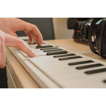 Load image into Gallery viewer, Korg FOLDPIANO49 49-Key Collapsible Folding Piano Keyboard, White-Easy Music Center