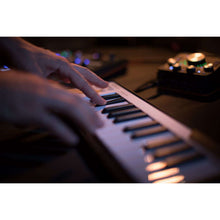 Load image into Gallery viewer, Arturia MICROLAB-OR MicroLab 25-Key Keyboard Controller, Orange-Easy Music Center