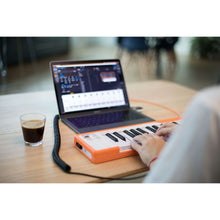 Load image into Gallery viewer, Arturia MICROLAB-OR MicroLab 25-Key Keyboard Controller, Orange-Easy Music Center