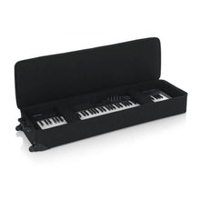 Load image into Gallery viewer, Gator GK-88-SLIM 88 Slim Keyboards Case w/ Wheels L 53.37&quot; W 15&quot; H 6&quot;-Easy Music Center
